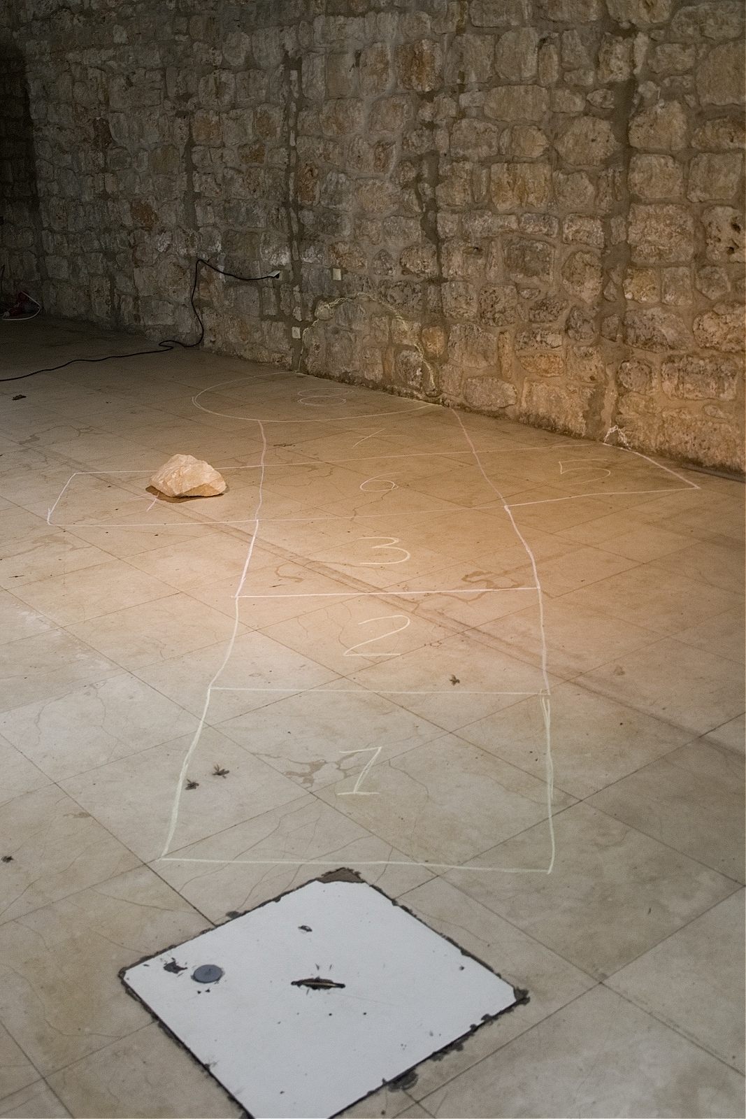 "Hell and Heaven", 2010, white charcoal, rock, appr. 250 x 500 cm